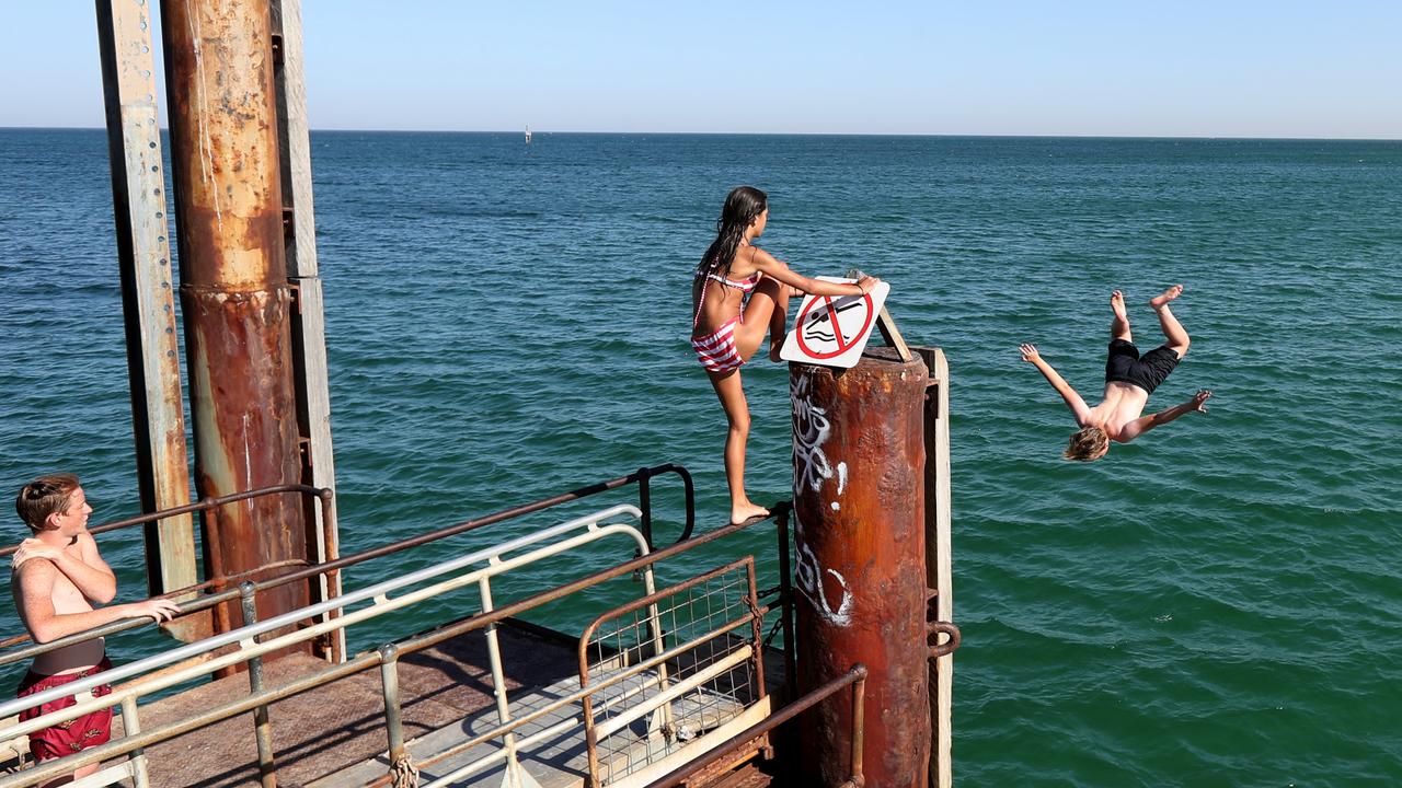 Recreational swimmers may not see them, but tide gauges around the world are measuring sea levels. (Kelly Barnes/AAP PHOTOS)