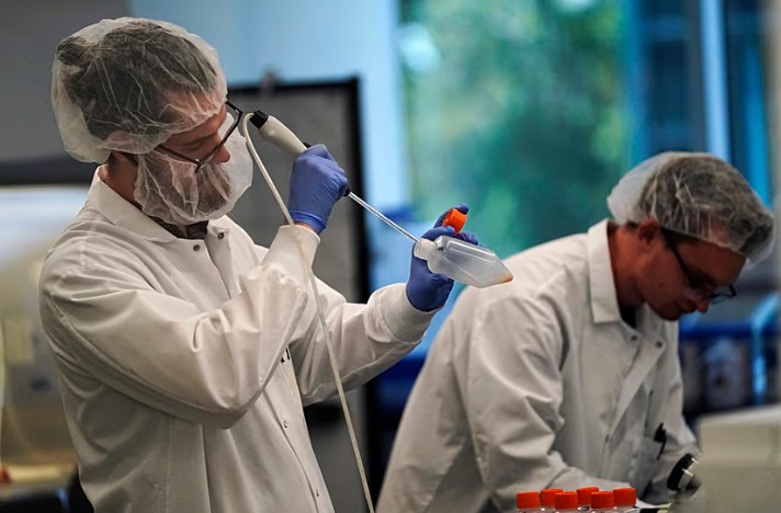 FILE - Scientists work in a bioprocess lab at Eat Just in Alameda, California, 14 June 2023 Jeff Chiu/Copyright 2023 The AP.