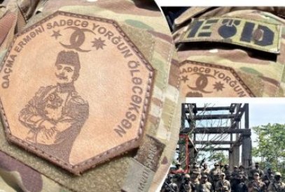 Patches with Enver Pasha on field uniform of Azerbaijani soldiers